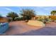 Desert landscape home with driveway and garage at 38844 N Spur Cross Rd, Cave Creek, AZ 85331