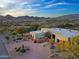 Another view of the home's exterior, showcasing its design and mountain views at 38844 N Spur Cross Rd, Cave Creek, AZ 85331