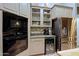 Kitchen boasts stainless steel appliances and wine fridge at 38844 N Spur Cross Rd, Cave Creek, AZ 85331