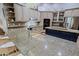 Modern kitchen featuring granite countertops, double sink, and stainless steel appliances at 38844 N Spur Cross Rd, Cave Creek, AZ 85331