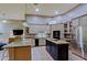 Updated kitchen featuring granite countertops and island at 38844 N Spur Cross Rd, Cave Creek, AZ 85331