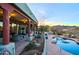 Spacious patio with pool and mountain views at 38844 N Spur Cross Rd, Cave Creek, AZ 85331