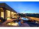 Stunning pool and spa with mountain views at sunset at 38844 N Spur Cross Rd, Cave Creek, AZ 85331