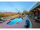 Stunning pool and patio area with mountain views at 38844 N Spur Cross Rd, Cave Creek, AZ 85331