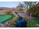 Relaxing water feature and putting green in the backyard at 38844 N Spur Cross Rd, Cave Creek, AZ 85331