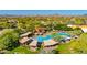 Aerial view of community pool, spa, and surrounding landscape at 3982 E Sandpiper Dr, Phoenix, AZ 85050