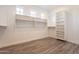 Large walk-in closet with built-in shelving at 3982 E Sandpiper Dr, Phoenix, AZ 85050