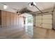 Spacious garage with built-in cabinets and overhead storage at 3982 E Sandpiper Dr, Phoenix, AZ 85050