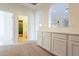 Bright hallway with built-in cabinets and access to bathroom at 3982 E Sandpiper Dr, Phoenix, AZ 85050