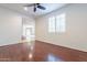 Living room with hardwood floors and a ceiling fan at 3982 E Sandpiper Dr, Phoenix, AZ 85050