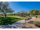 Community playground with play structures and shaded areas at 3982 E Sandpiper Dr, Phoenix, AZ 85050