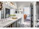 Elegant bathroom with double vanity and view of bedroom at 40715 N Lytham Ct, Phoenix, AZ 85086