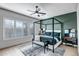 Main bedroom with a canopy bed and green accent wall at 40715 N Lytham Ct, Phoenix, AZ 85086