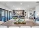 Elegant dining area with a built-in bar and seating area at 40715 N Lytham Ct, Phoenix, AZ 85086