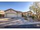 Stunning three-car garage home with desert landscaping at 40715 N Lytham Ct, Phoenix, AZ 85086