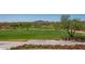 Golf course with cart storage and flower bed at 40715 N Lytham Ct, Phoenix, AZ 85086