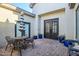 Private patio with seating area and blue planters at 40715 N Lytham Ct, Phoenix, AZ 85086