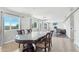 Spacious dining area with glass-top table and adjacent living space at 4344 E Desert Crest Dr, Paradise Valley, AZ 85253