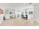 Modern kitchen with island and breakfast bar, adjacent to a seating area at 4344 E Desert Crest Dr, Paradise Valley, AZ 85253