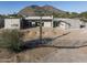 Aerial view of a new construction home with mountain backdrop at 5120 N Casa Blanca Dr, Paradise Valley, AZ 85253