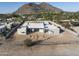 Aerial view of a luxury home under construction, mountain view at 5120 N Casa Blanca Dr, Paradise Valley, AZ 85253