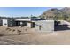 Under construction home showcasing stone exterior and mountain views at 5120 N Casa Blanca Dr, Paradise Valley, AZ 85253