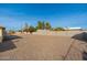 Large gravel backyard with block wall and clear view at 5452 E University Dr, Mesa, AZ 85205