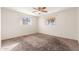 Bedroom with carpet and ceiling fan at 5452 E University Dr, Mesa, AZ 85205