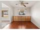 Dining area with tile floors and wood cabinets at 5452 E University Dr, Mesa, AZ 85205