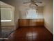 Simple dining room with tiled floors and built-in storage at 5452 E University Dr, Mesa, AZ 85205