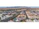 Aerial view of a residential community with houses and roads at 5609 W Posse Dr, Eloy, AZ 85131