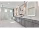 Elegant bathroom with double vanity, large shower, and modern fixtures at 5609 W Posse Dr, Eloy, AZ 85131