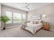 Main bedroom with plush carpet and pool view at 5609 W Posse Dr, Eloy, AZ 85131