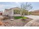 Single story home with gray shutters and a nicely landscaped yard at 5609 W Posse Dr, Eloy, AZ 85131