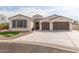 Craftsman style home with two-car garage and landscaped front yard at 5609 W Posse Dr, Eloy, AZ 85131