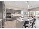 Sleek kitchen featuring a curved island and double ovens at 5609 W Posse Dr, Eloy, AZ 85131