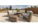 Relaxing patio furniture with fire pit, perfect for outdoor entertaining at 5609 W Posse Dr, Eloy, AZ 85131