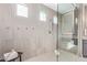 Spacious shower with built-in seat and multiple shower heads at 5609 W Posse Dr, Eloy, AZ 85131