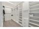 Large walk-in closet with ample shelving and drawers at 5609 W Posse Dr, Eloy, AZ 85131