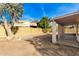 Large backyard with covered patio and block wall at 6634 E Preston St, Mesa, AZ 85215