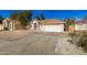 Front view of a single-story house with a two-car garage at 6634 E Preston St, Mesa, AZ 85215