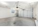 Spacious garage with high ceilings and ample storage at 6634 E Preston St, Mesa, AZ 85215