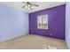 Bedroom with two-toned walls and ceiling fan at 7110 W Villa Lindo Dr, Peoria, AZ 85383