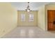 Bright dining room featuring tile floors and a chandelier at 7110 W Villa Lindo Dr, Peoria, AZ 85383