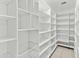 Large walk-in pantry with adjustable shelving at 7110 W Villa Lindo Dr, Peoria, AZ 85383