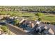 Golf course community with numerous houses visible from above at 7227 E Texas Ebony Dr, Gold Canyon, AZ 85118