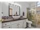 Bathroom with modern vanity and glass shower at 7227 E Texas Ebony Dr, Gold Canyon, AZ 85118