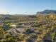 Aerial view of community amenities including pool and tennis courts at 7227 E Texas Ebony Dr, Gold Canyon, AZ 85118