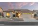 One-story house with a neutral color scheme and front yard at 7227 E Texas Ebony Dr, Gold Canyon, AZ 85118