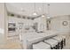 Modern kitchen with white cabinets and a large island at 7227 E Texas Ebony Dr, Gold Canyon, AZ 85118